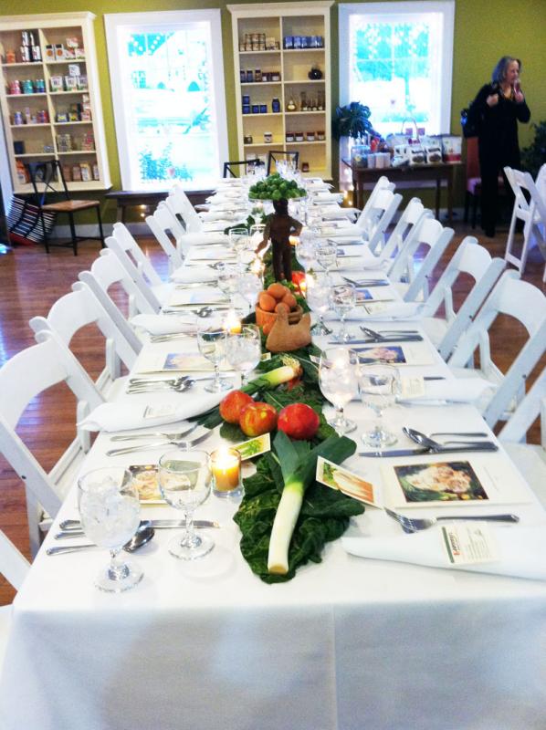 Tables decorated with fresh produce representative of the season, including kales, leeks, potatoes, eggs, and apples. (Courtesy Ladleah Dunn)