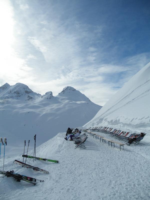 "Having slaked our thirst for powder, we munched contentedly on our sandwiches as the unmoving sea of craggy mountains surged and crashed around us."