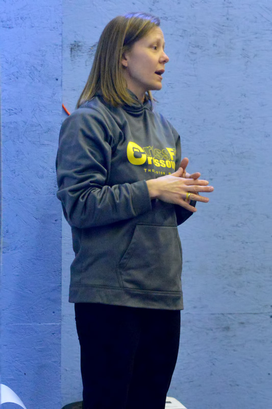 Coach Teel Foster gives direction prior to the start of the CrossFit Crossover Throwdown March 9. (Photo by Ron Hawkes)