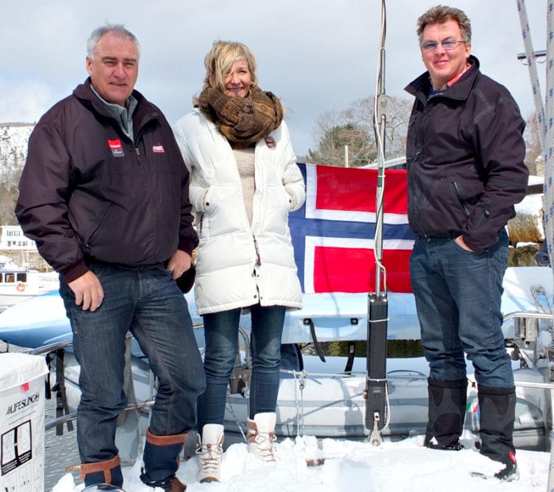Norwegians Trond Aasvoll, Linda Lindeberg and Lars Ingeberg after sailing into Camden Harbor during Tuesday's snowstorm. (Photo by Chris Wolf)