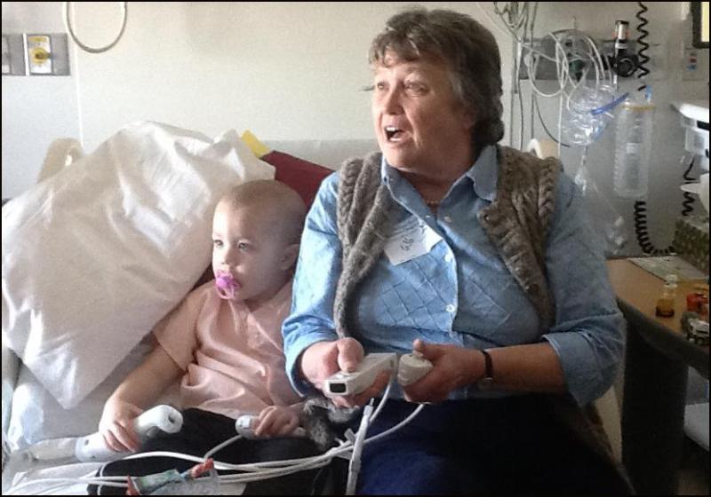 Andy O'Brien teaches his grandmother, Diane, how to play Mario Kart. (Photo courtesy of the O'Briens)