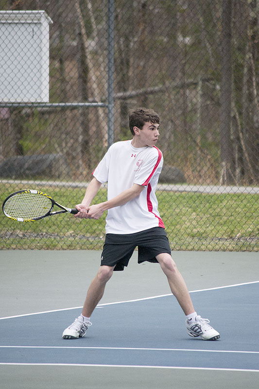 Camden Hills Austin Pohlman about to return a shot in the number 1 singles match (Photo Courtesy of Dwight Pitcairn)