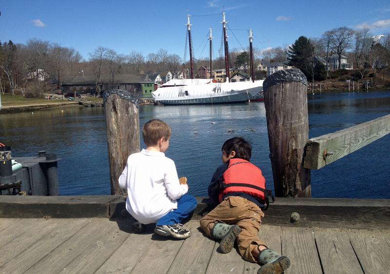 Henry Pixley, son of Camden Harbormaster Steve Pixley, and a friend, James, inspect the seagulls along the harbor's edge. (Courtesy Steve Pixley)