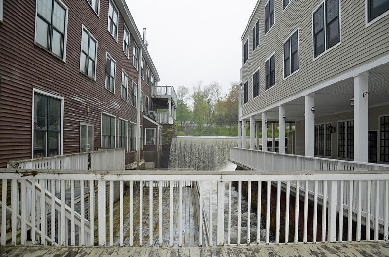 Separated by the Megunticook River, Smokestack Grill is to the left, Knox Mill condominiums to the right. (Photo by Holly S. Edwards)