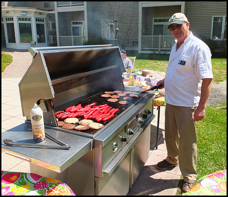 Mike Fletcher mans the grill.