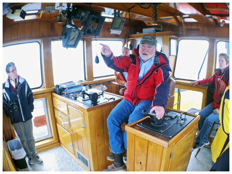 Capt. John Worth aboard one of four tugboats operated by the Penobscot Bay Tractor Tug Co. The Belfast-based subsidiary of Fournier Tugs primarily guides cargo ships and other large vessels in and out of ports in Penobscot Bay. (Photo by Ethan Andrews)