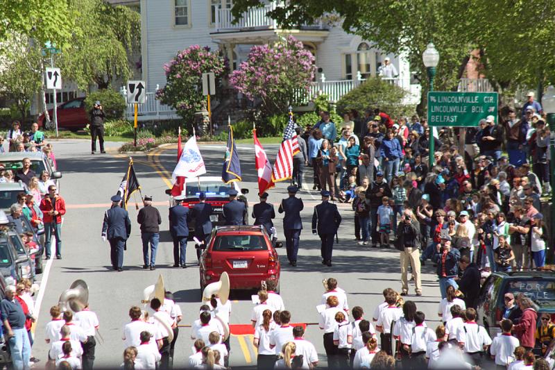 The Memorial Day parade makes it way up Elm Street in downtown Camden, following a stop at adjacent Harbor Park. (Photo by Holly S. Edwards)