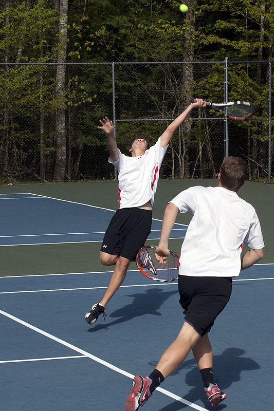Camden Hills Alex Forcillo Stretching for the ball in the No. 1 doubles match. (Photo Courtesy of Dwight Pitcairn)