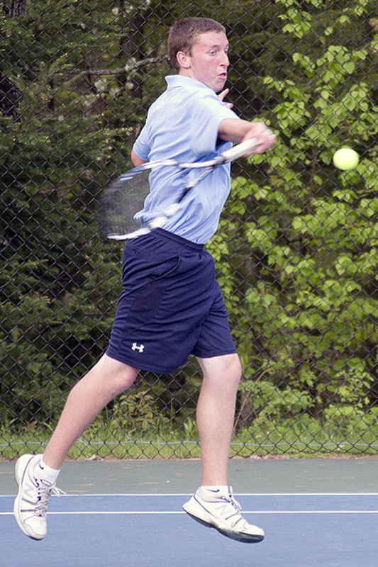 Oceanside's Cameron Butler in action during the No. 1 singles match. (Photo Courtesy of Dwight Pitcairn)
