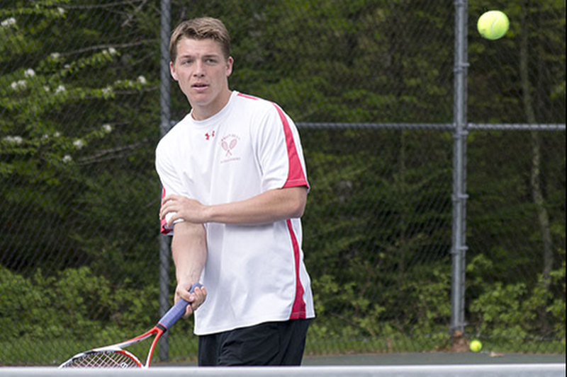 Camden Hills Peter Vannordall lobs a return. (Photo Courtesy of Dwight Pitcairn)