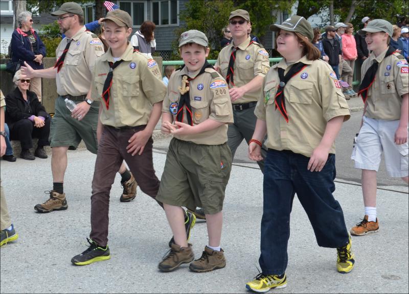 Boy Scouts cheerfully cross the Goose River Bridge in Rockport during the town's annual Memorial Day parade, May 27. (Photo by Lynda Clancy)