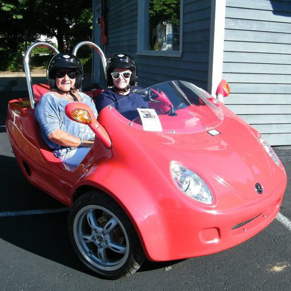 I call shotgun int he Scoot Coupe! (Courtesy Midcoast Adventures Scooter and Bicycle Rentals)