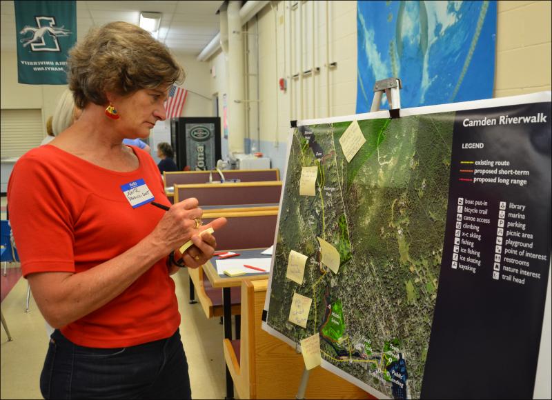 Anita Brosius Scott, of Camden, takes a look at the Riverwalk concept. (Photo by Lynda Clancy)