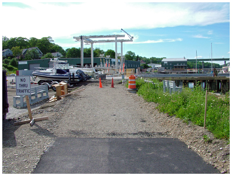 The view on June 18 from the temporary northern end of the Belfast Harbor Walk toward the Armistice footbridge, to which the path is expected to connect by late summer or early fall. (Photo by Ethan Andrews)