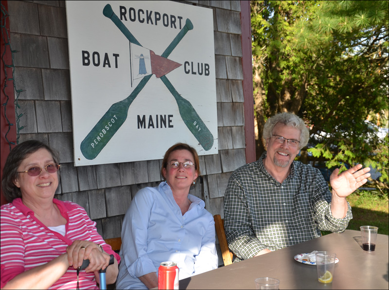 Rockport residents Helen Shaw, Terri Mackenzie and Richard Remsen thank Tom Ford for his 12 years as Rockport's planner. (Photo by Lynda Clancy)