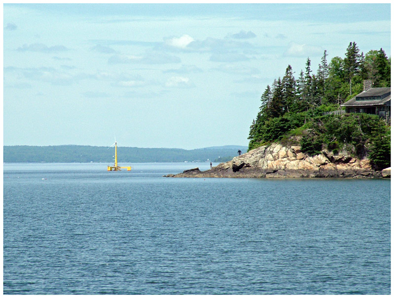 A first glimpse of VolturnUS 1:8, seen on the way out of Castine Harbor. Dyce Head is visible at right. (Photo by Ethan Andrews)