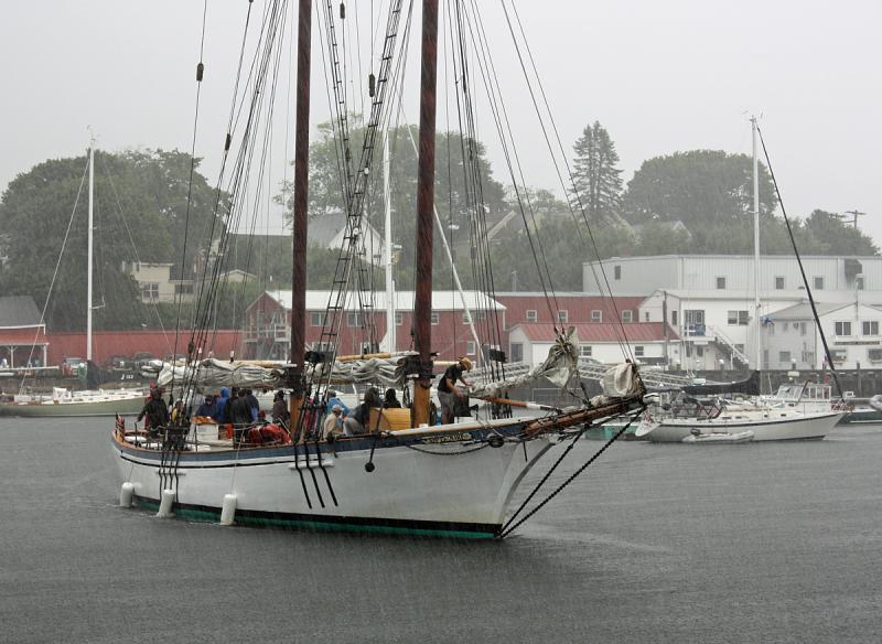 Schooner Appledore makes the turn at the head of the harbor, bound for its berth in front of Graffam's Restaurant. (Photo by Holly S. Edwards)