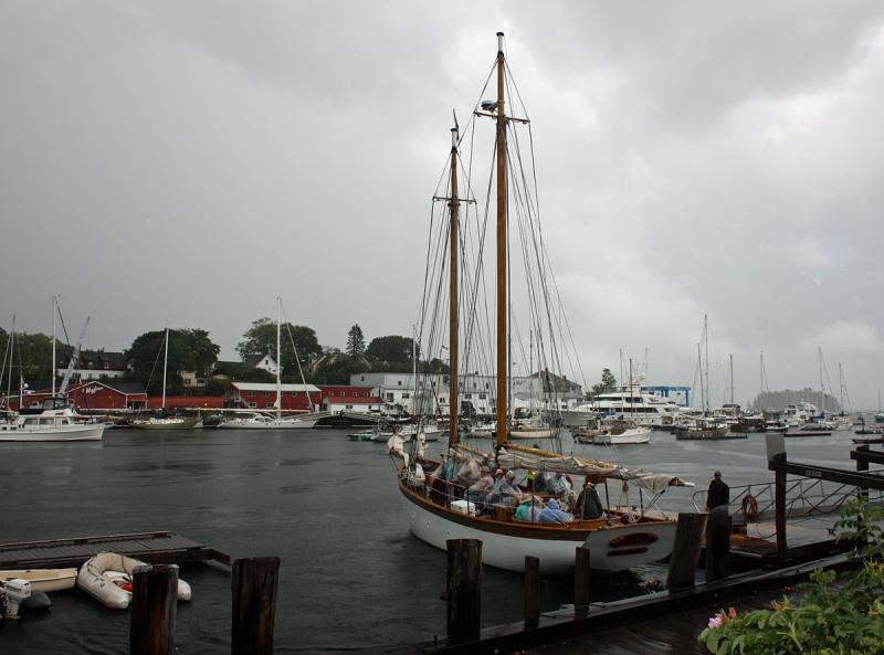 Schooner Olad backs in alongside its dock in Camden Harbor in the rain Wednesday afternoon. (Photo by Holly S. Edwards)