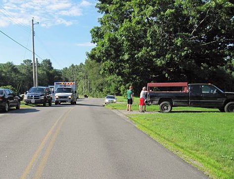 The pickup truck that turned in front of the motorcycle this morning, causing it to crash, sits in the driveway it was turning into on Sennebec Road in Appleton. (Courtesy Knox County Sheriff's Office)