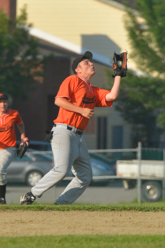 Rockland's Zach Peaco makes the catch n a high fly ball to shortstop. (Photo by Ron Hawkes)