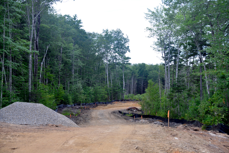 The PITCH will be set far off the road around this corner and quite a distance back into the area of the project. The entire building will not be seen from the road. (Photo by Ron Hawkes)