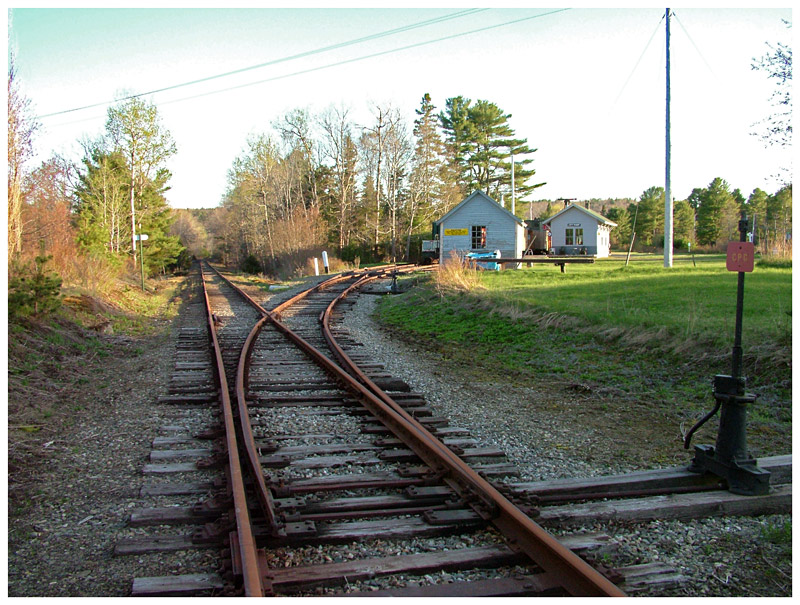 City Point Station as seen from Oak Hill Road. Excursion trains operated by Brooks Preservation Society currently access the station using the track at right. The left fork, which goes toward downtown Belfast, is to be converted to a recreational trail. (Photo by Ethan Andrews)