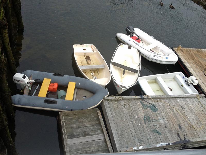 A group of unpermitted dinghies, which were tagged and ticketed by the harbormaster's staff at least four days ago, are now relocated and corralled in preparation for removal from the harbor Tuesday. By town ordinance, all dinghies must have permits to tie up for more than a few hours in the harbor. (Courtesy Steve Pixley)