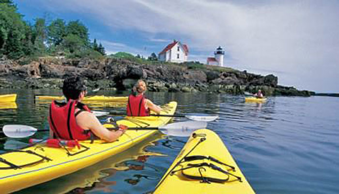 Sea kayaking around Curtis Island. (Courtesy Breakwater Kayak)