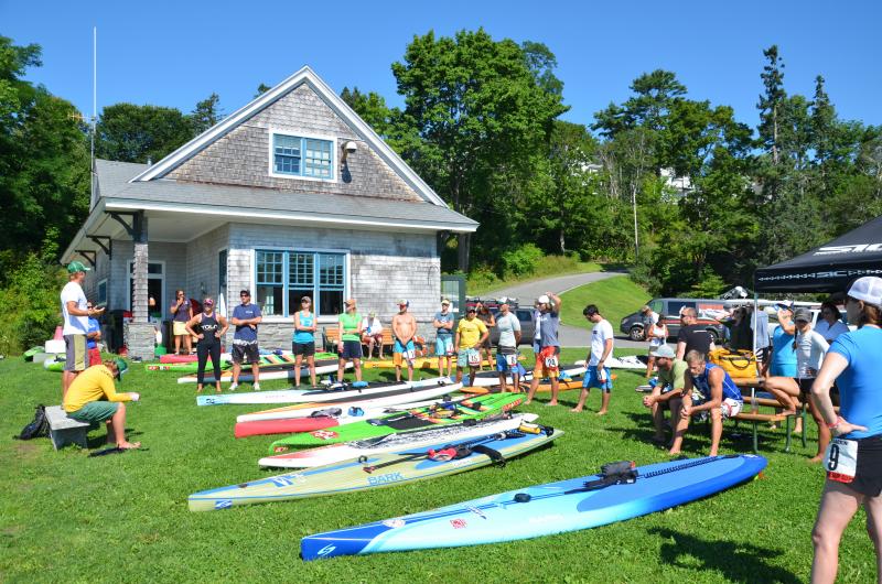 Thor Emory, owner of Thorfinn Expeditions and organizer of the Lobster SUP Cup, briefs racers at Marine Park in Rockport on Aug. 10. (Photo by Lynda Clancy)