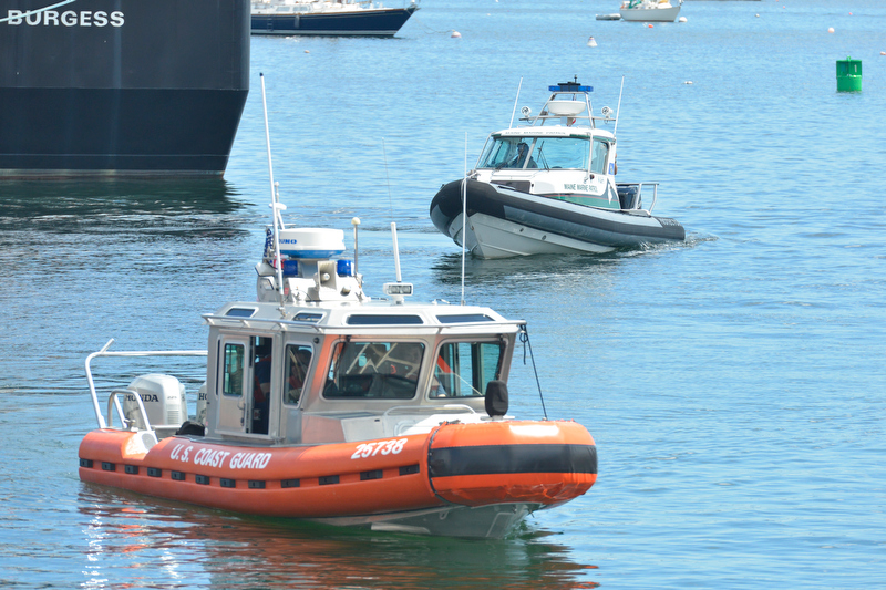 U.S. Coast Guard and Rockland Harbor boats search the inner harbor off Journey's End Marina. (Photo by Ron Hawkes)