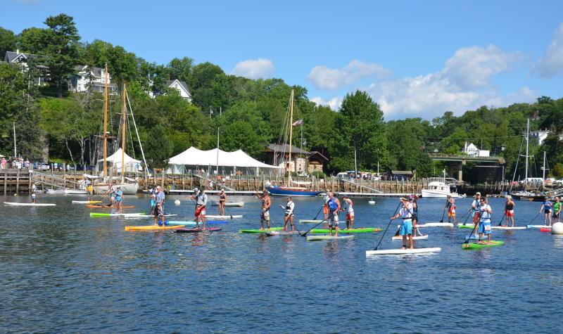 Milling about in Rockport Harbor, just before the bagpipes began to play, and the start of the race. (Photo by Lynda Clancy)
