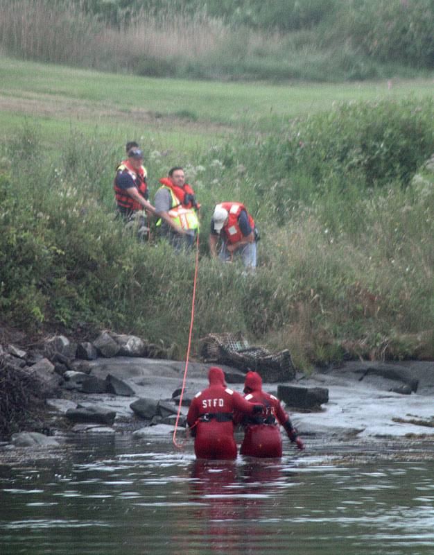 Getting the last rescuer and 'victim' out of the river. (Photo by Holly S. Edwards)