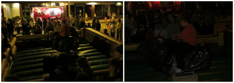 A young boy attempts to ride the mechanical bull. (Photo by Erica Thoms)