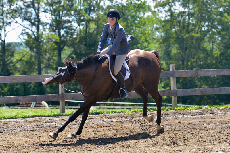 Katherine Orne riding in a competition at the Stonewall Stables in Nobleboro Saturday. (Photo by Ron Hawkes)