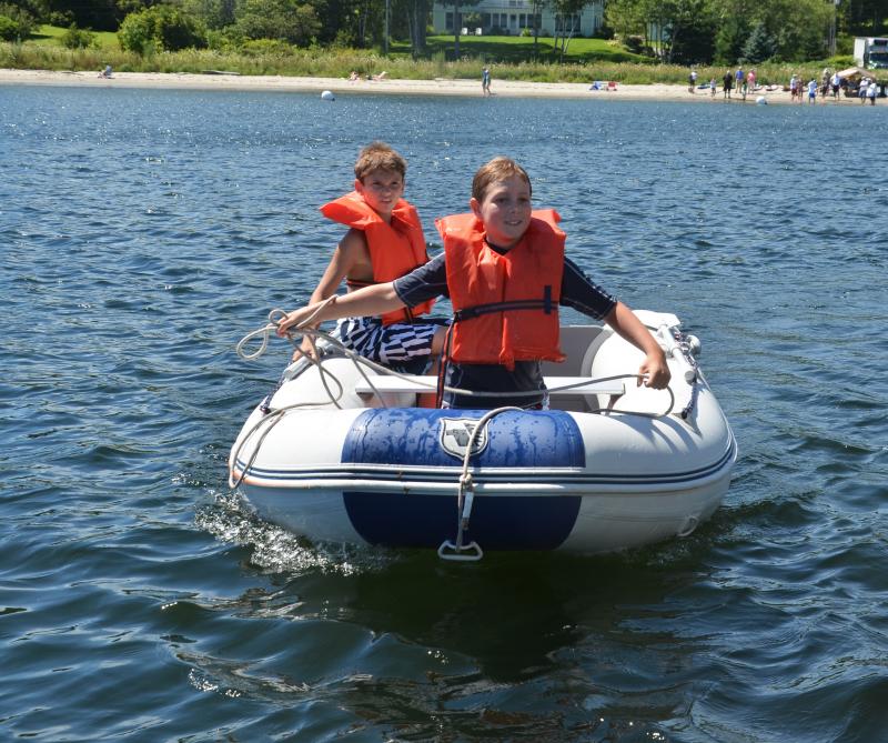 Corey and Beau, from Louisiana, were at Lincolnville Beach and kind enough to offer launch service to the shore. (Photo by Lynda Clancy)
