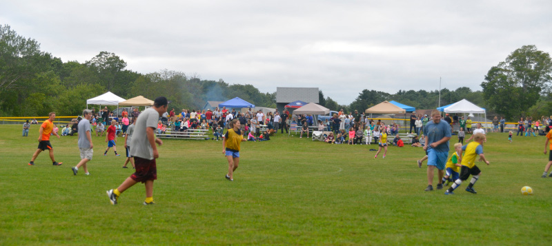 Hundredd and hundreds of members of the Midcoast community flocked to the Warren Athletic Fields Thursday to celebrate the life of Laken Kyle Harrington, and give tremendous support and love to the Harrington family. (Photo by Ron Hawkes)