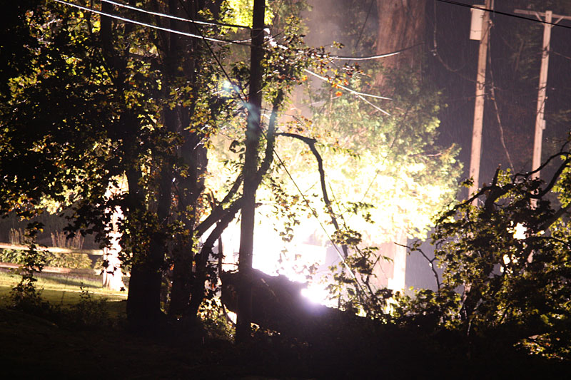 The bright light emitting from the downed transformer in Camden was hard to look at. (Photo by Holly S. Edwards)