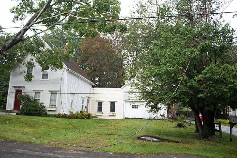 The bare spot on the lawn of this home on Park Street was caused by fallen transformer, that arced and smoked and burned for about 20 minutes until CMP cut the power to the town of Camden Wednesday night. (Photo by Holly S. Edwards)