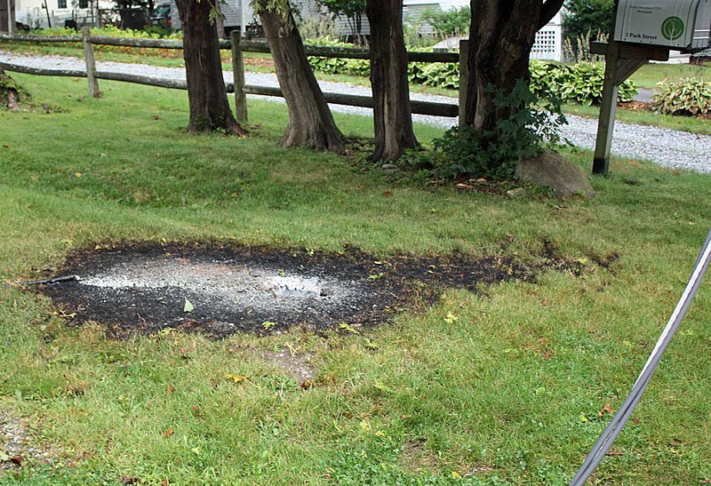 All that’s left at the scene of the burning transformer in Camden is this burned patch of grass. (Photo by Holly S. Edwards)