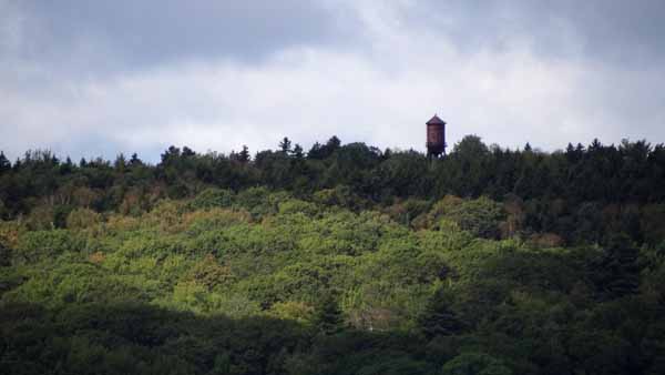 Hidden from the land bound, Penobscot Bay offers occasional views of man-made beauty amid natural surroundings. (Photo by Shlomit Auciello)
