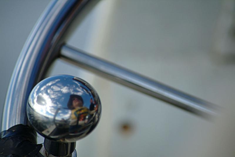 A budding mariner, reflected in the tools of the trade. (Photo: Shlomit Auciello)