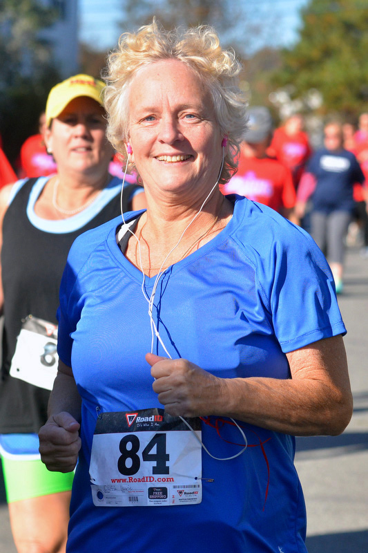 Laurie Curtin ran her first ever 5K with the support of her family. (Photo By Ron Hawkes)