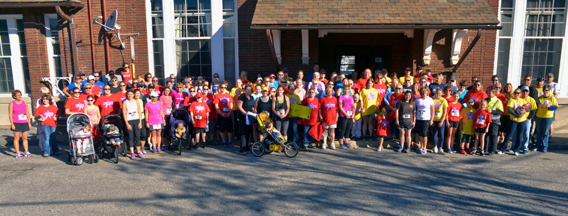 Most of the runners and walkers gathered in front of Trackside Station Restaurant where the event took place. (Photo by Ron Hawkes)