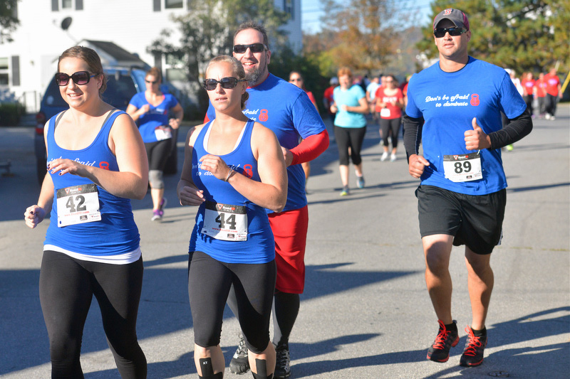 A club called “Don’t be afraid to dominate” had quite a number of runners in the race. (Photo by Ron Hawkes)