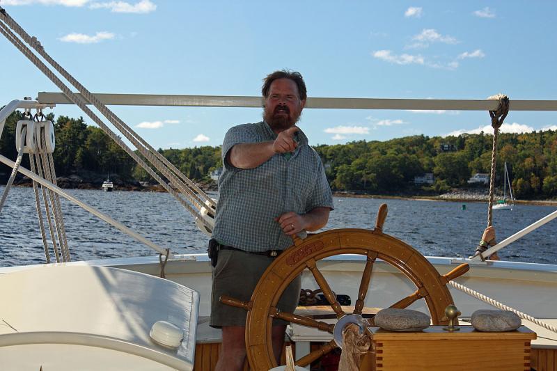 Capt. Barry King provides a little instruction at the start of the sail out of Camden Sept. 26. (Photo by Holly S. Edwards)