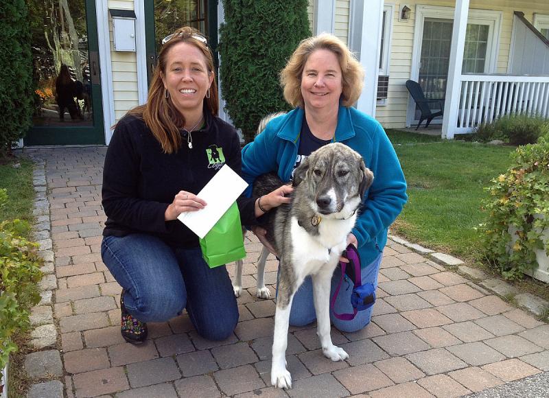 Barb Maccallum and Anna with contest co-sponsor Heidi Neal of Loyal Biscuit outside co-sponsor Country Inn. (Photo by Terri Mahoney)