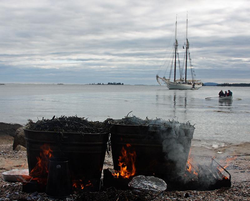 Dinner cooks away while another group of passengers is rowed ashore, to the beach. (Photo by Holly S. Edwards)