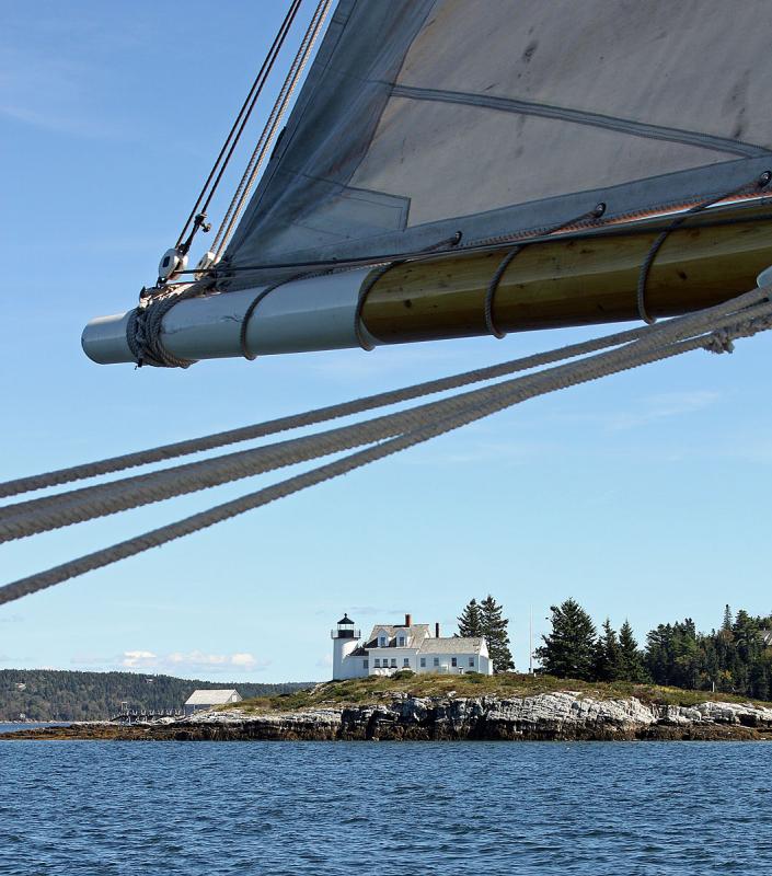 Sailing past Pumpkin Island Lighthouse on Eggemoggin Reach in Penobscot Bay. (Photo by Holly S. Edwards)