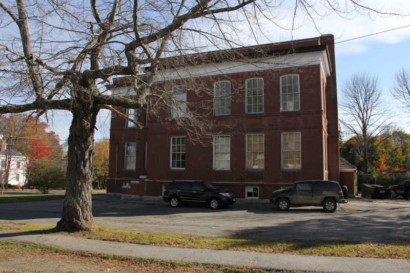 Future plans for the former elementary school and music academy have been put on the back burner as workers secure the building for the approaching winter. (Photo by Wes Sterrs)
