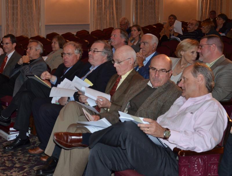 The players. Left to right, first row: Attorney Matt Mananhan, Attorney Rendle Jones, Attorney Cliff Goodall, Attorney Paul Gibbons, Economist Charles Lawson, Fox Hill investor Tom Rodman, and McLean Hospital’s Philip Levunsky. (Photo by Lynda Clancy)